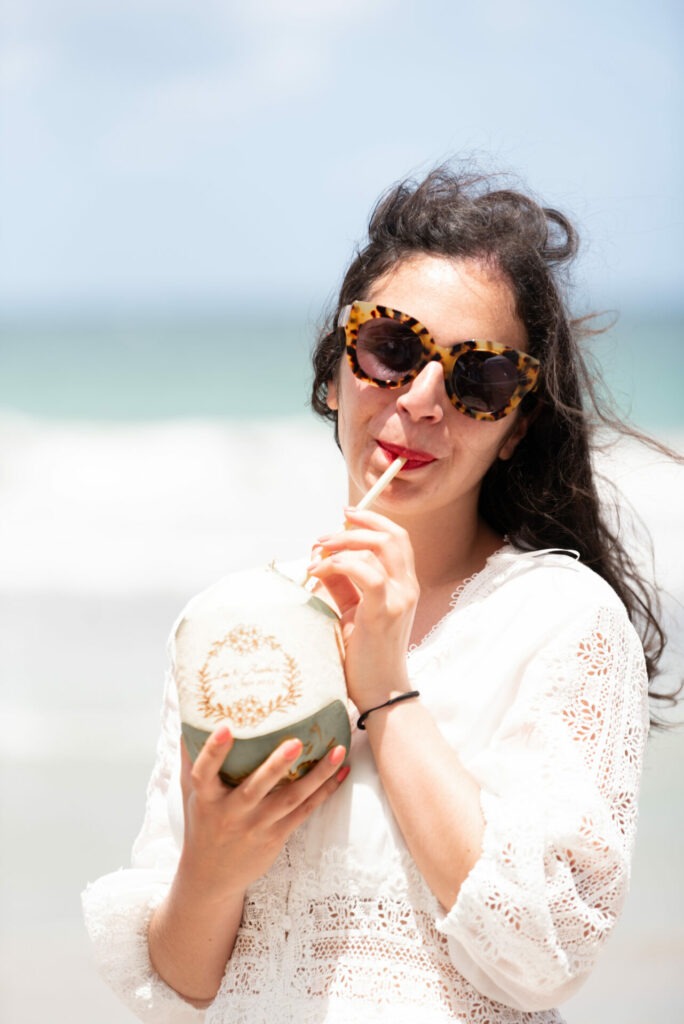 Coconut cocktail and Creole lunch on the beach at Le Chill restaurant in Le Diamant, Martinique.