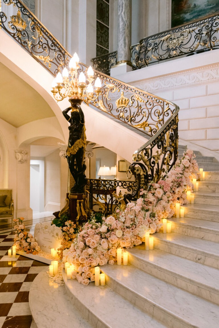 Elegant candlelit staircase design at Shangri-La Paris for a luxury destination wedding in France Remi Dupac Phtotography